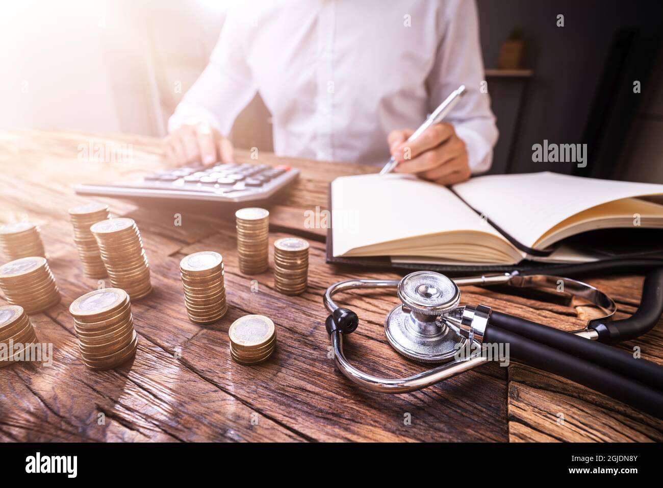 Health And Medical Insurance Cost. Invoice Calculator Stock Photo Alamy