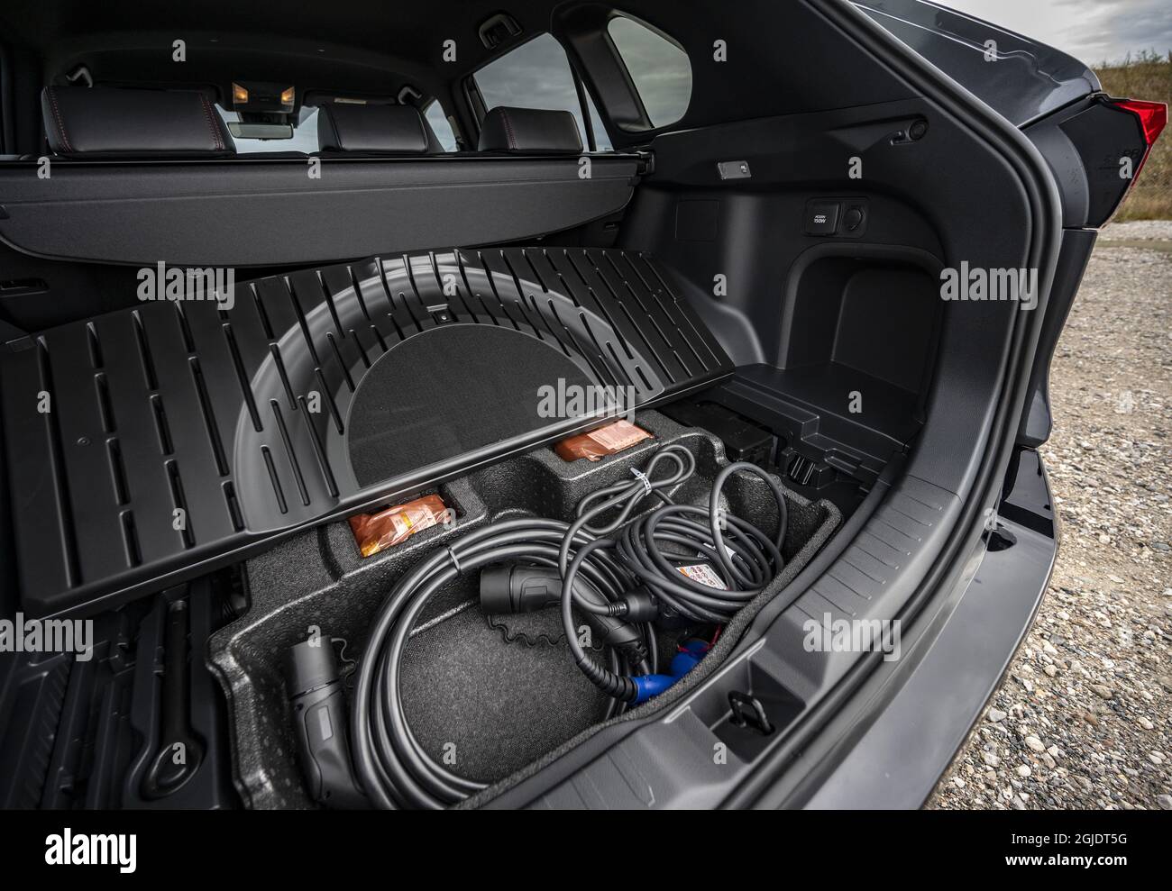 Toyota RAV4 Plug-in Hybrid AWD-i photographed in connection with a press  screening at Kastrup. Charging cables in the boot / trunk. Photo: Johan  Nilsson / TT / code 50090 Stock Photo - Alamy