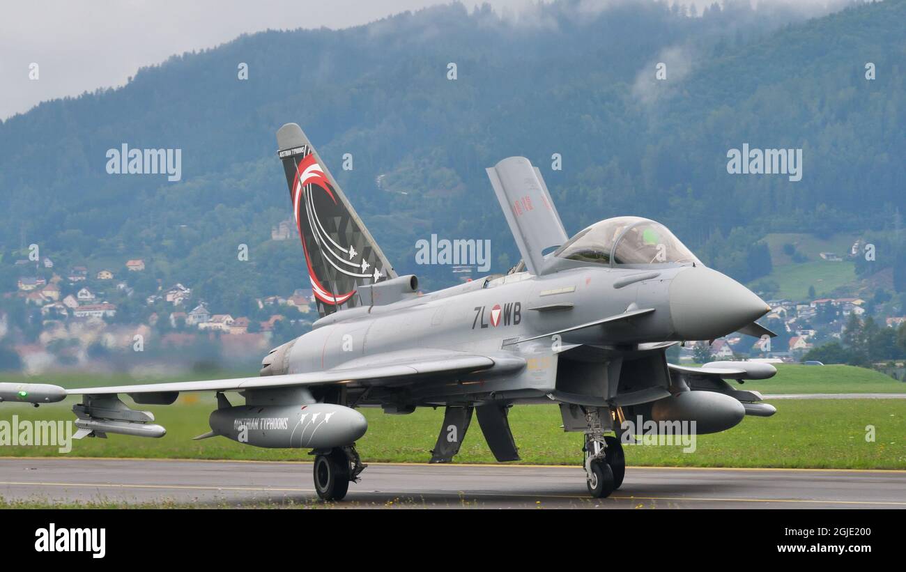 Zeltweg, Austria SEPTEMBER, 6, 2019 Front close up of a military aircraft with air brake open and colored tail. Eurofighter Typhoon EFA of Austrian Air Force Stock Photo