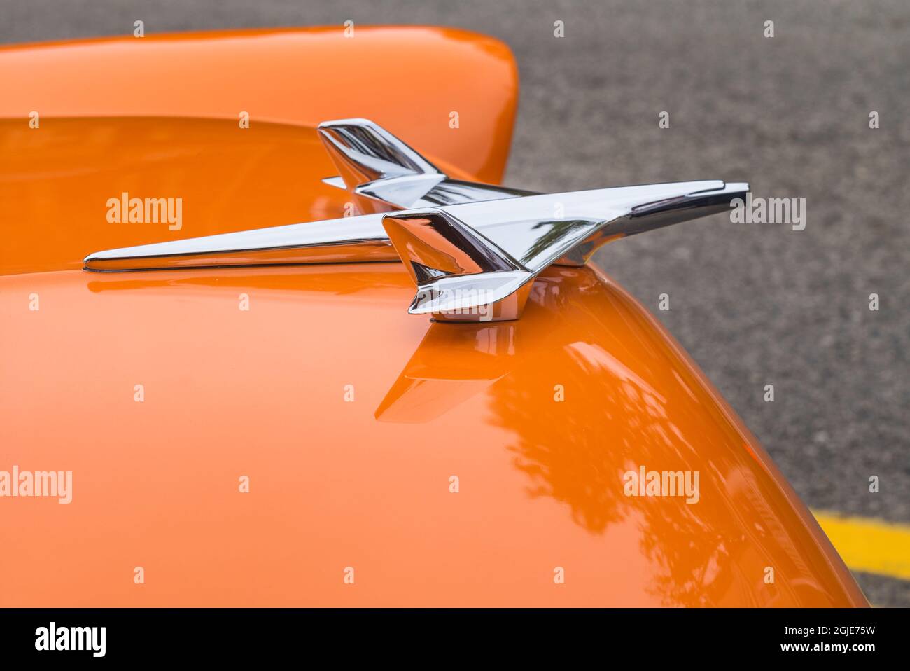 USA, Massachusetts, Essex. Antique cars, detail of 1950'sera airplane