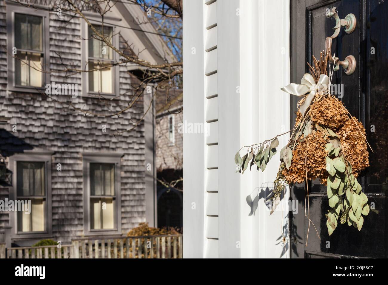 USA, Massachusetts, Nantucket Island. Nantucket Town, door wreath decoration. Stock Photo