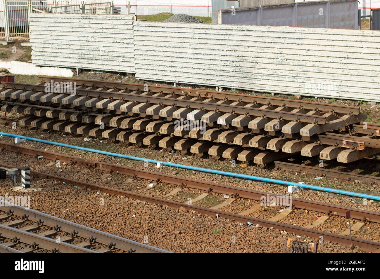 Rails for the railway. Prepared rails on the tracks. The place of ...