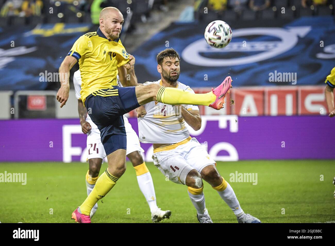 Sweden's Marcus Danielson (L) and Armenia's Taron Voskanyan fight for the ball during the International Friendly soccer match between Sweden and Armenia at Friends Arena in Stockholm, Sweden, on June 5, 2021. Photo: Janerik Henriksson / TT / code 10010 *** SWEDEN OUT ***  Stock Photo