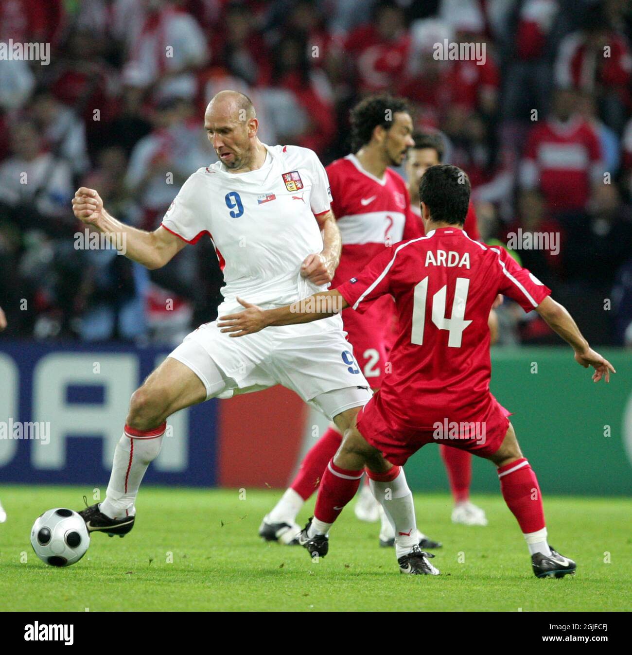 Turkey's Arda TURAN and Czech Republic Jan KOLLER (L) during the group A match between Turkey and Czech Republic at Stade de Geneve Stadium in Geneva, Switzerland at the Euro 2008 European Soccer Championships in Austria and Switzerland. Stock Photo