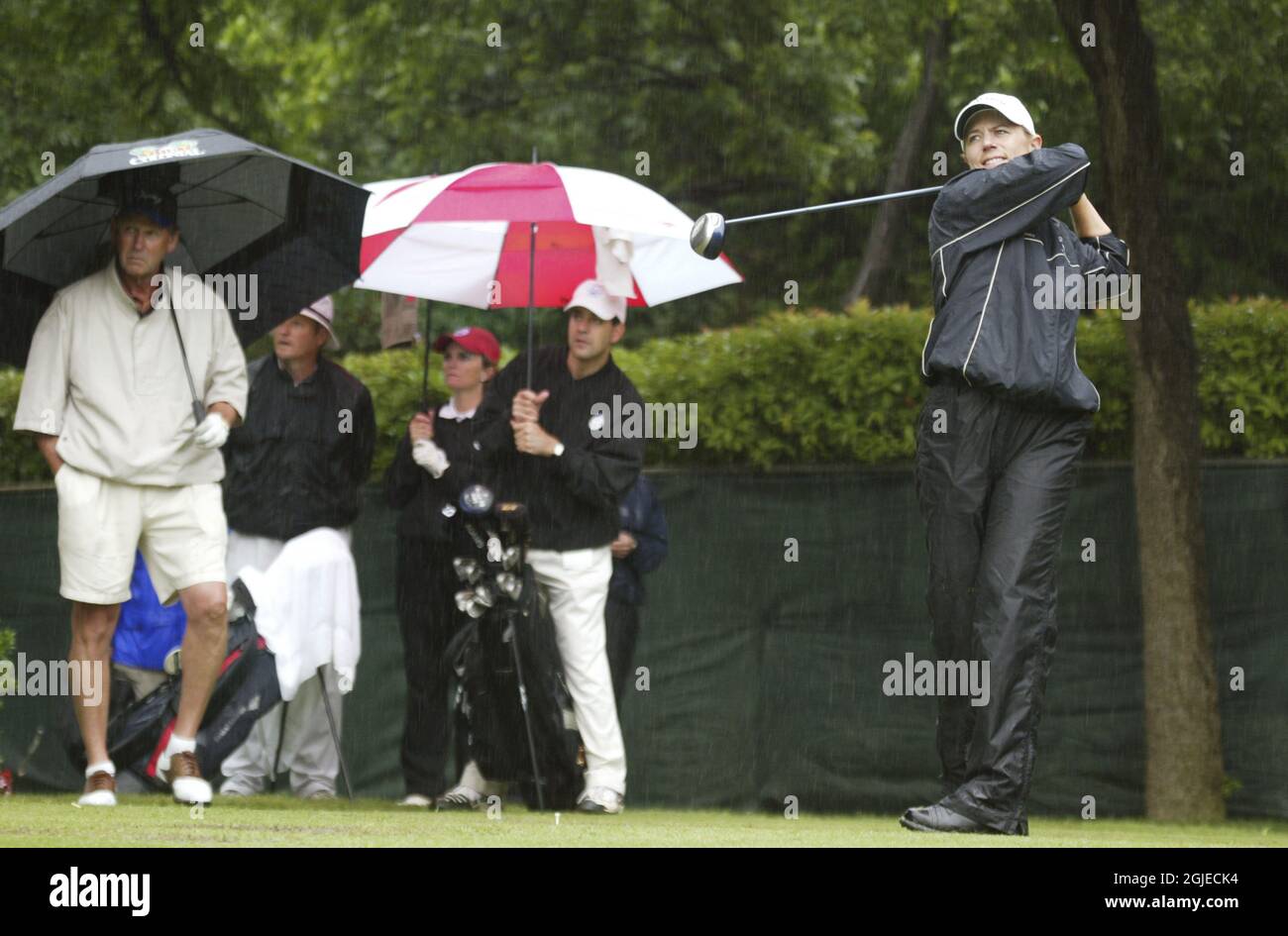 Annika Sorenstam driving from the second tee in heavy rain during the pro-am at the Colonial Country Club   Stock Photo