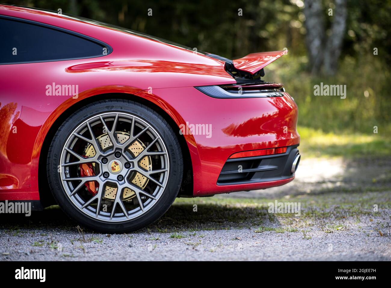 A red Porsche 911 Carrera 4S 2019/2020 A red car Photo: Pontus Lundahl / TT  / code 10050 Stock Photo - Alamy