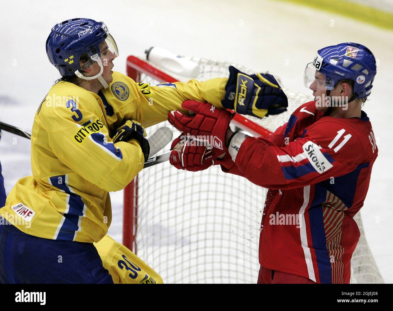 Swedens Alexander Hellstrom fights it out with Vladimir Soboktn of Czech Republic in the Junior World Ice Hockey Championships in Leksand, Sweden Stock Photo Nude Pic Hq