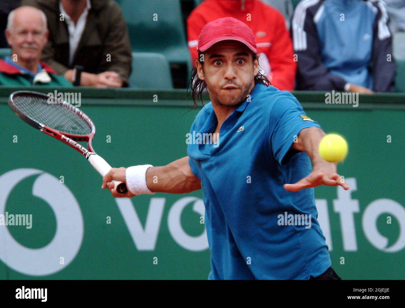 Mariano Zabaleta hits a forehand return Stock Photo - Alamy