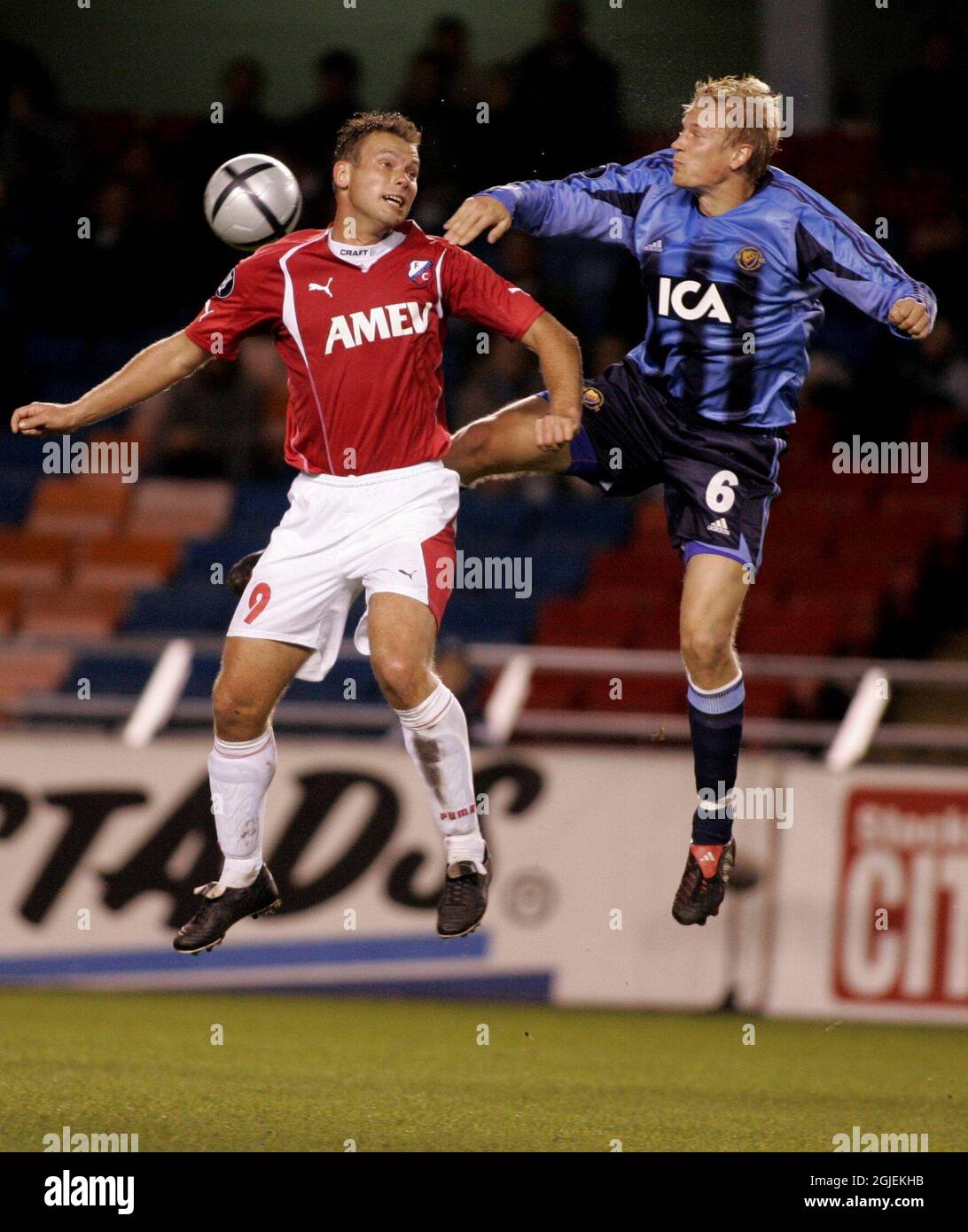 Djurgarden's Toni Kuivasto (r) jumps for a header with FC Utrecht's Hans Van Der Haar (l) Stock Photo