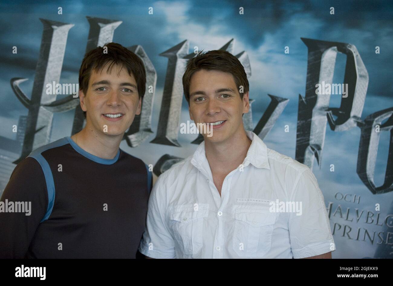 Actors Oliver, left, and James, right, Phelps pose for a photographer ...