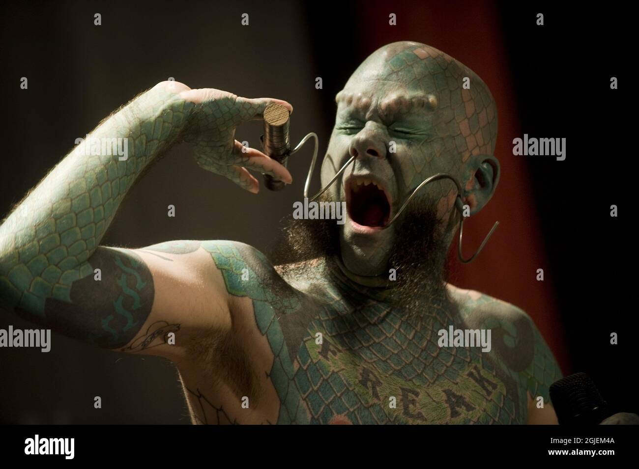 The Lizard man, Eric Sprague, of Fort Campbell, KY, USA during the Stockholm Inkbash tattoo fair Saturday. He has full body tattoo of green scales, sharpened teeth and green-inked lips and transformed ears. Stock Photo