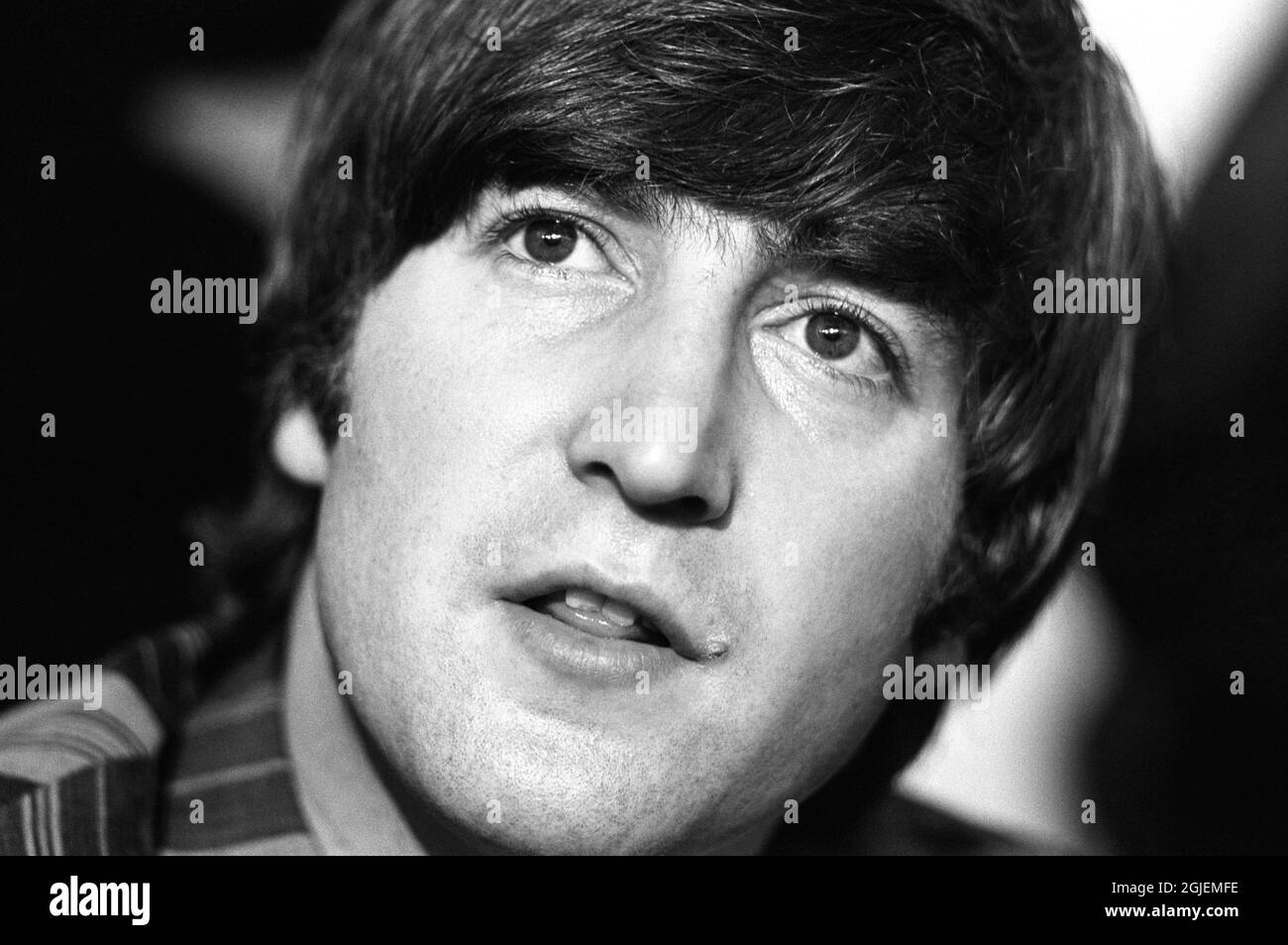 John Lennon during a press conference with the Beatles at Foresta Hotel in Stockholm, Sweden July 28 1964. The Beatles stayed at Foresta Hotel during their two concerts July 28 and 29. Stock Photo