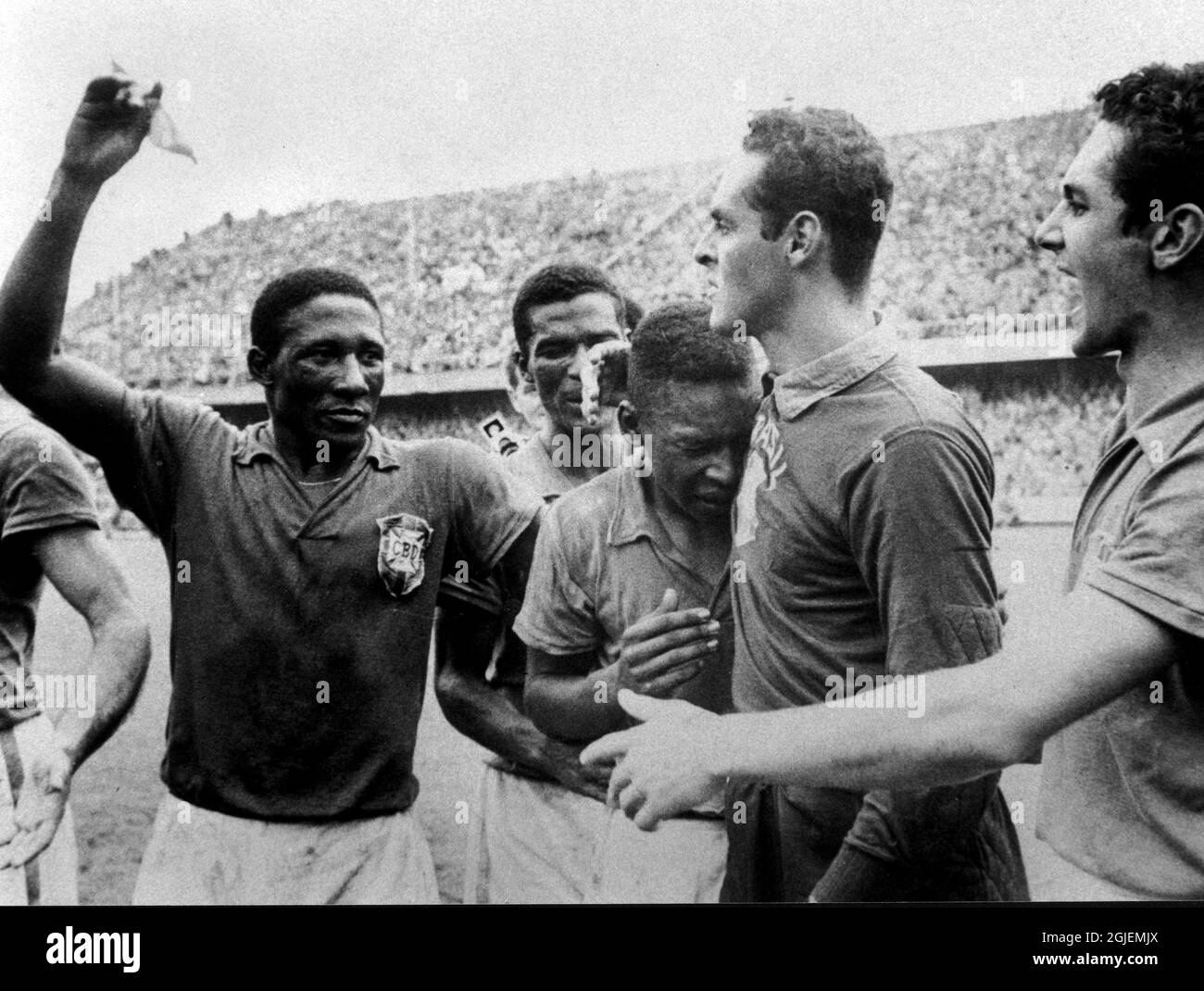 The 1958 FIFA World Cup football finalsbetween Sweden and Brazil held at Rasunda stadium, Sweden. PelÃ© in tears, after Brazils fifth goal in the last minute, and is comforted by goal keeper Gylmar. Brazil won the final 5-2 and became World Champions. Stock Photo