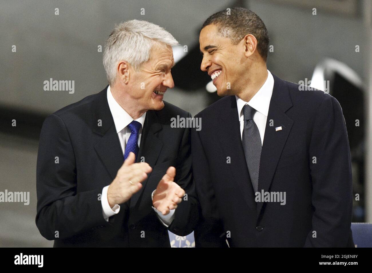 The 2009 Nobel Peace laureate, US President Barack Obama shares a smile with Nobel committee chairman Thorbjorn Jagland during the Nobel award ceremony in the City Hall of Oslo, Norway, December 10, 2009. Stock Photo