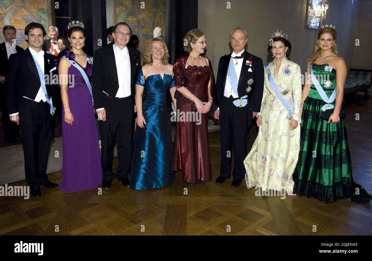 The Swedish royal family Prince Carl Philip, Crown princess Victoria, King Carl XVI Gustaf, Queen Silvia and Princess Madeleine pose with Nobel medicine laureates Jack W. Szostak, Carol W. Greider and Elizabeth H. Blackburn after the Nobel Banquet at the Town Hall in Stockholm. Stock Photo