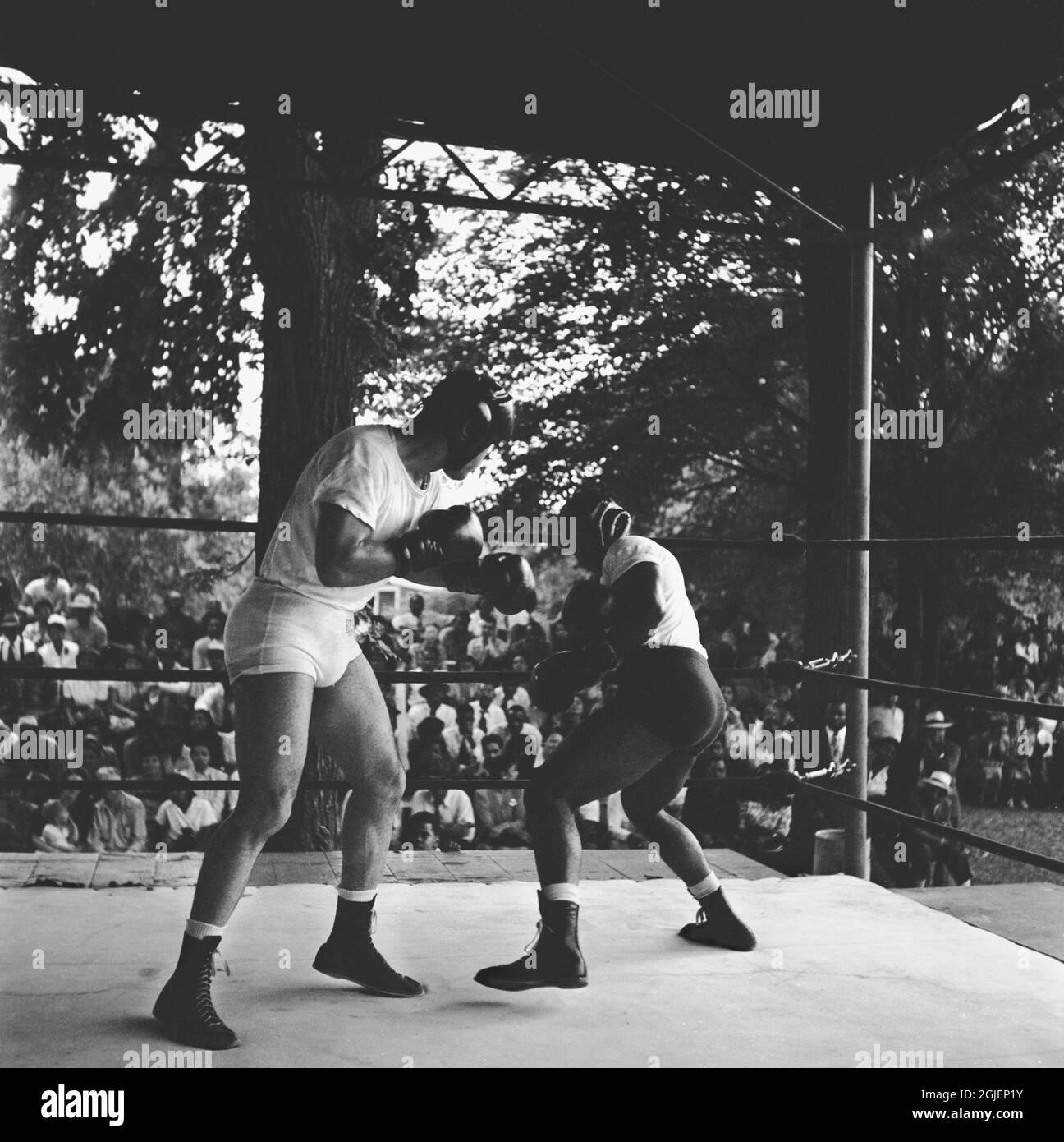 Joe Louis, American boxer spars during a training camp in Pompton Lakes,  New Jersey. Louis was