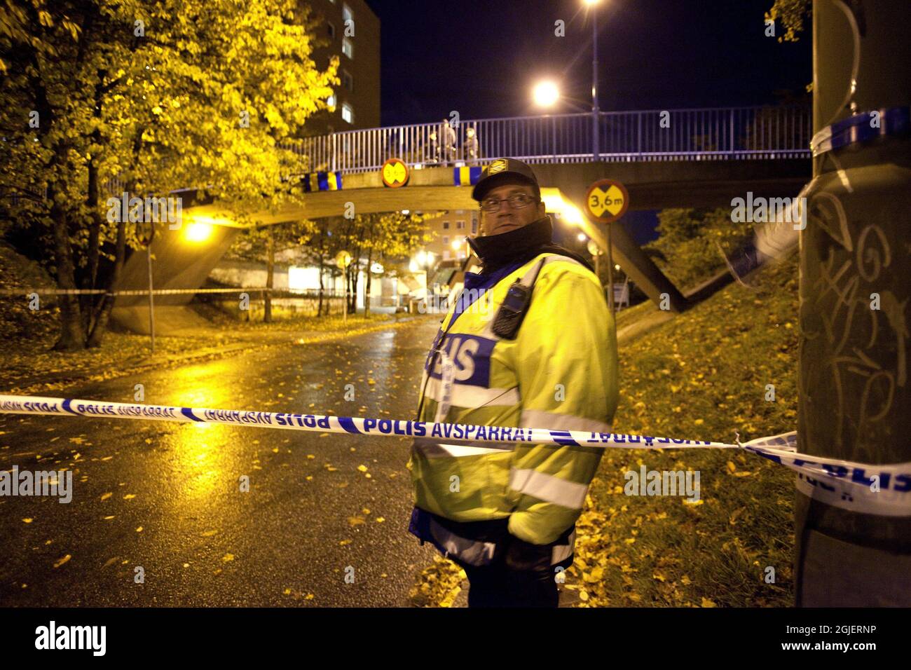 Police on the scene where two women with immigrant backgrounds were shot through an apartment window at Sorbacksgatan in Malmo, Sweden. The south Swedish city of Malmo has been shaken by at least 10 to 15 shootings aimed at persons with immigrant background over the last year. One victim has died and several are suffering from serious injuries. The police in Malmo suspect one person is behind a majority of the shootings. Stock Photo