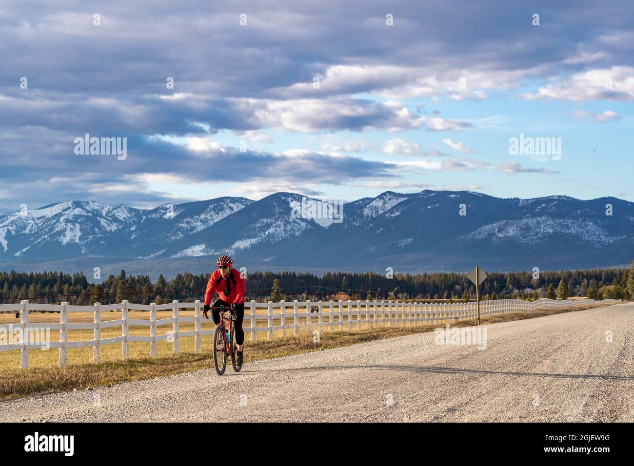 Bicycling on gravel roads of the Flathead Valley, Montana USA. (MR) Stock Photo