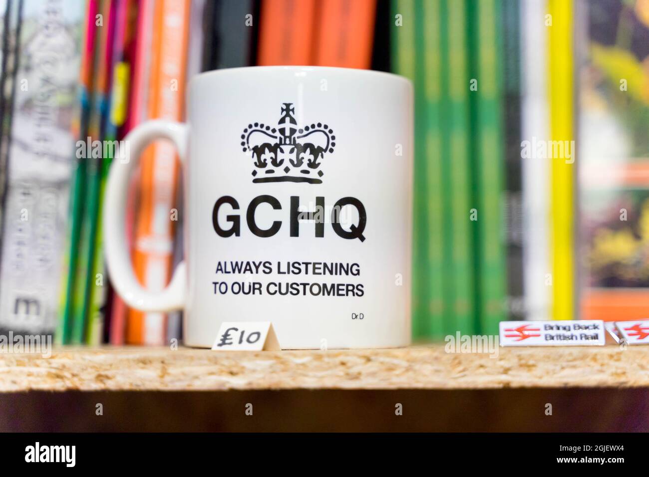 Mug with message, GCHQ always listening to our customer Stock Photo