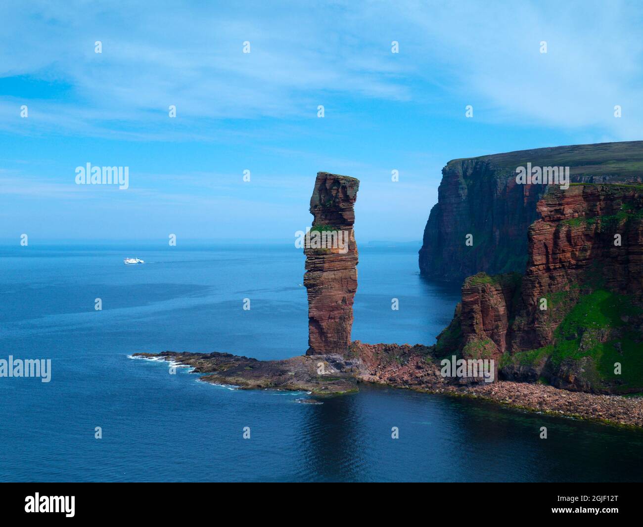 Old Man of Hoy with Northlink ferry, Orkney Isles Stock Photo