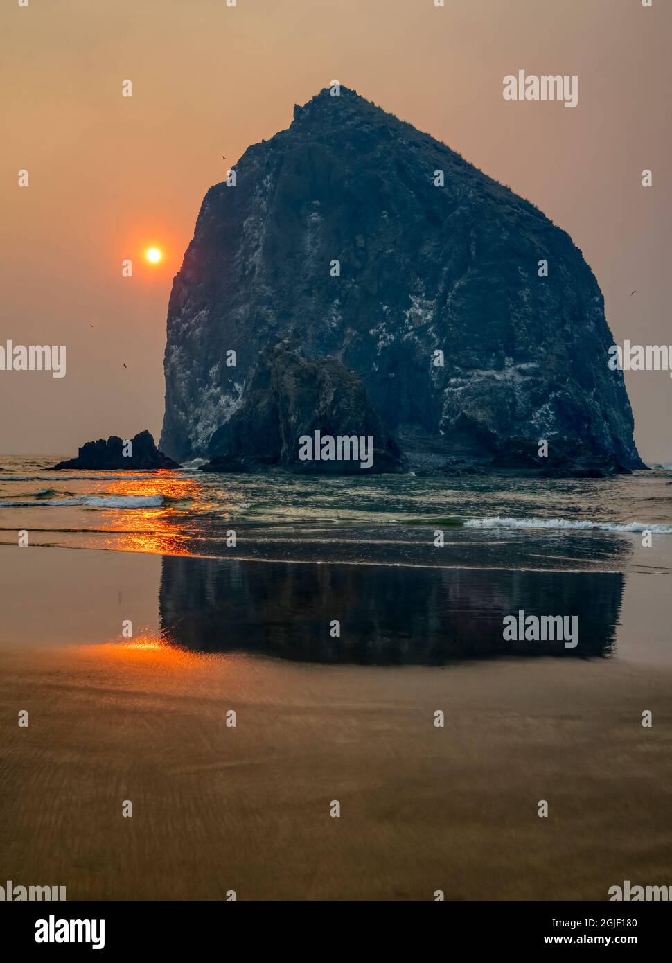 Oregon, Cannon Beach. Haystack Rock Stock Photo