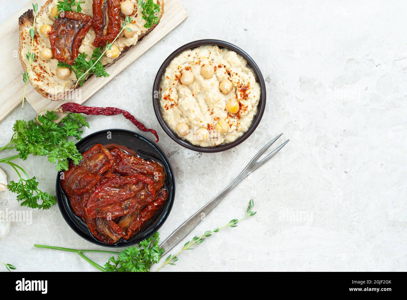 Hummus with black chickpea Stock Photo Alamy
