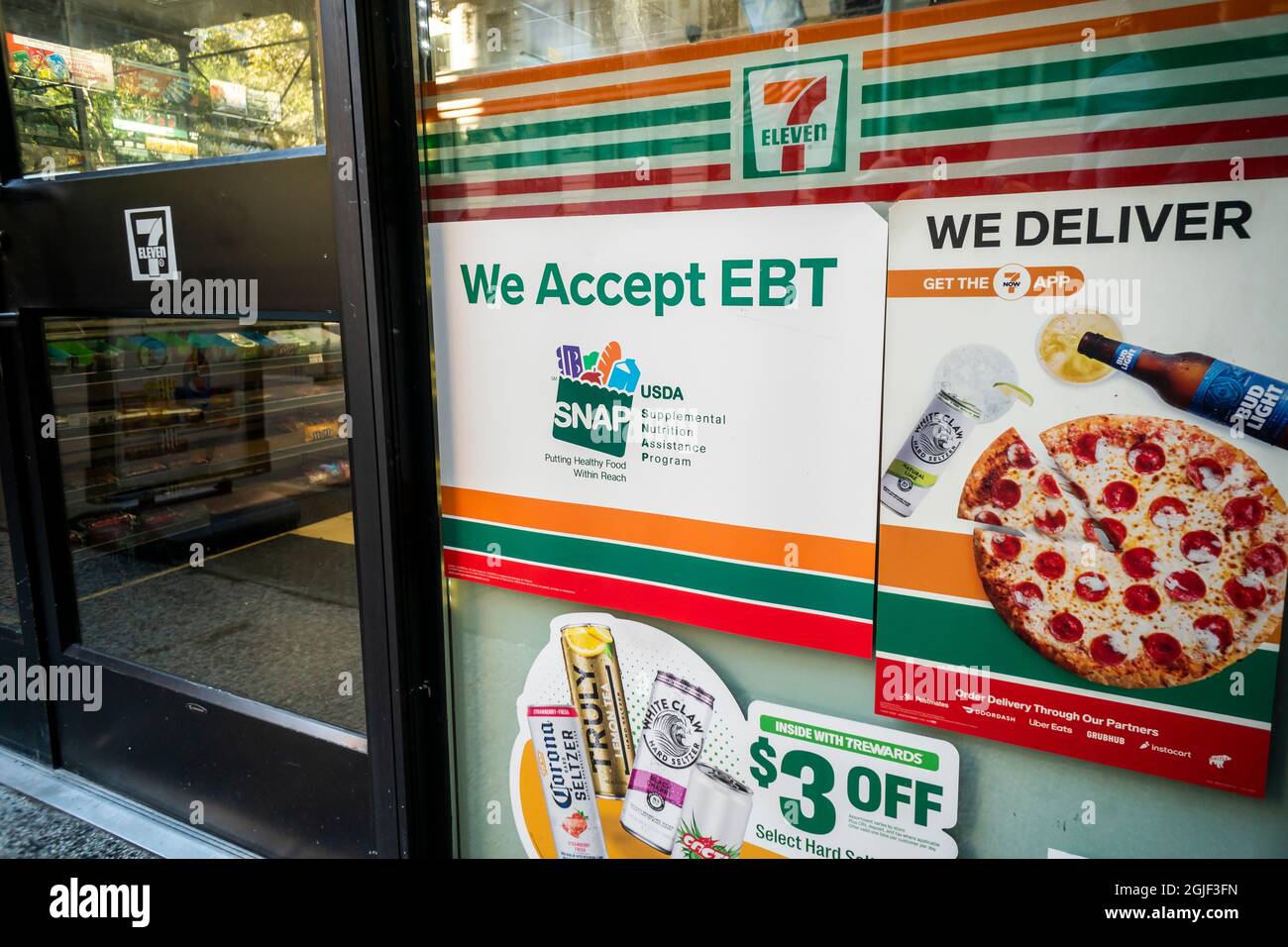 A sign in the window of a 7Eleven in New York announces that the