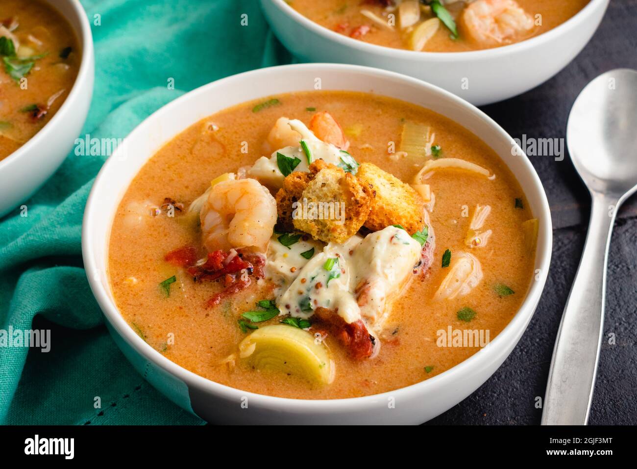 Bowls of Shrimp and Crab Bisque with Garnish Seafood bisque topped