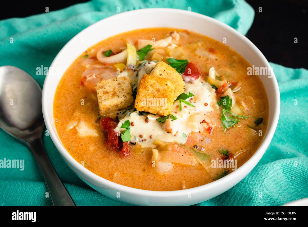 Bowls of Shrimp and Crab Bisque with Garnish Seafood bisque topped