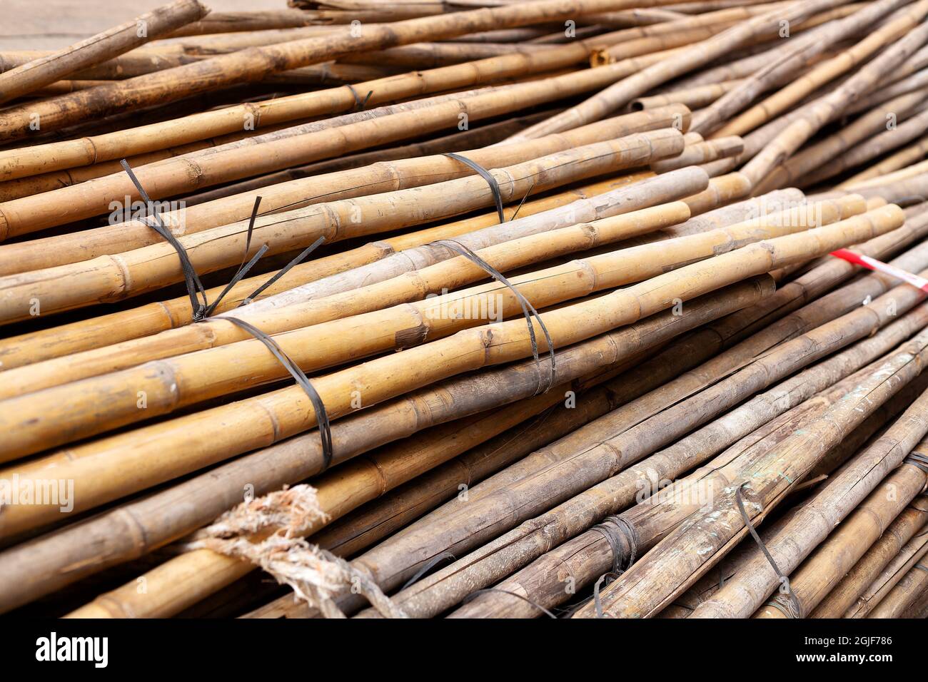 A pile of bamboo rods ready for use in scaffoldings in Chinese