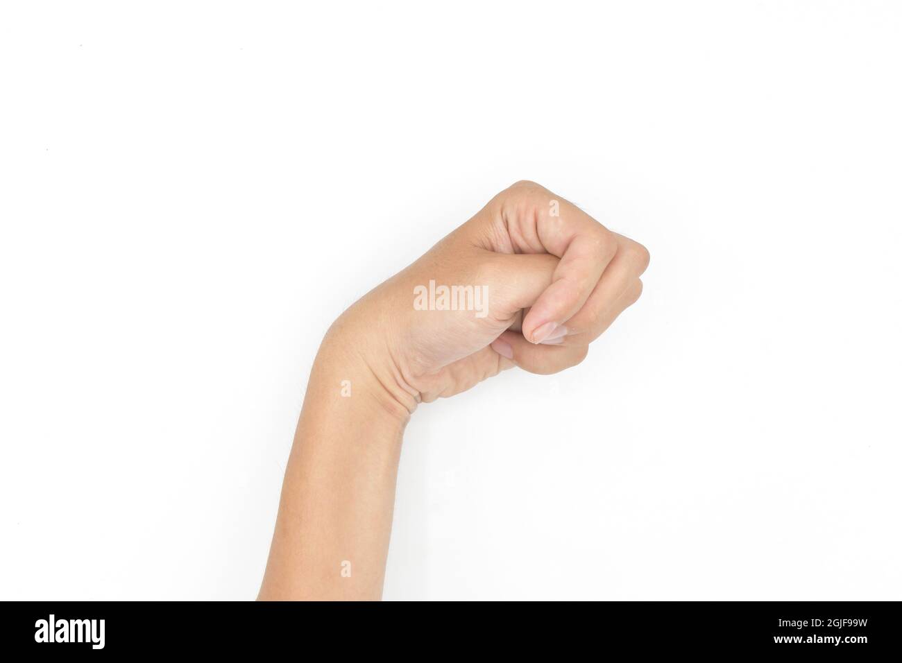 Hand muscle spasm in Asian young man. Unilateral fingers flexion. Isolated on white background. Stock Photo