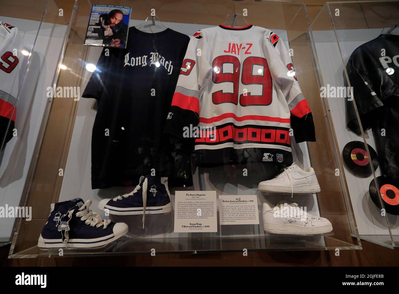 Hip-Hop artists Snoop Dogg and Jay-Z's T-shirt, hockey jersey and sneakers  display in Rock and Roll Hall of Fame.Cleveland.Ohio.USA Stock Photo - Alamy