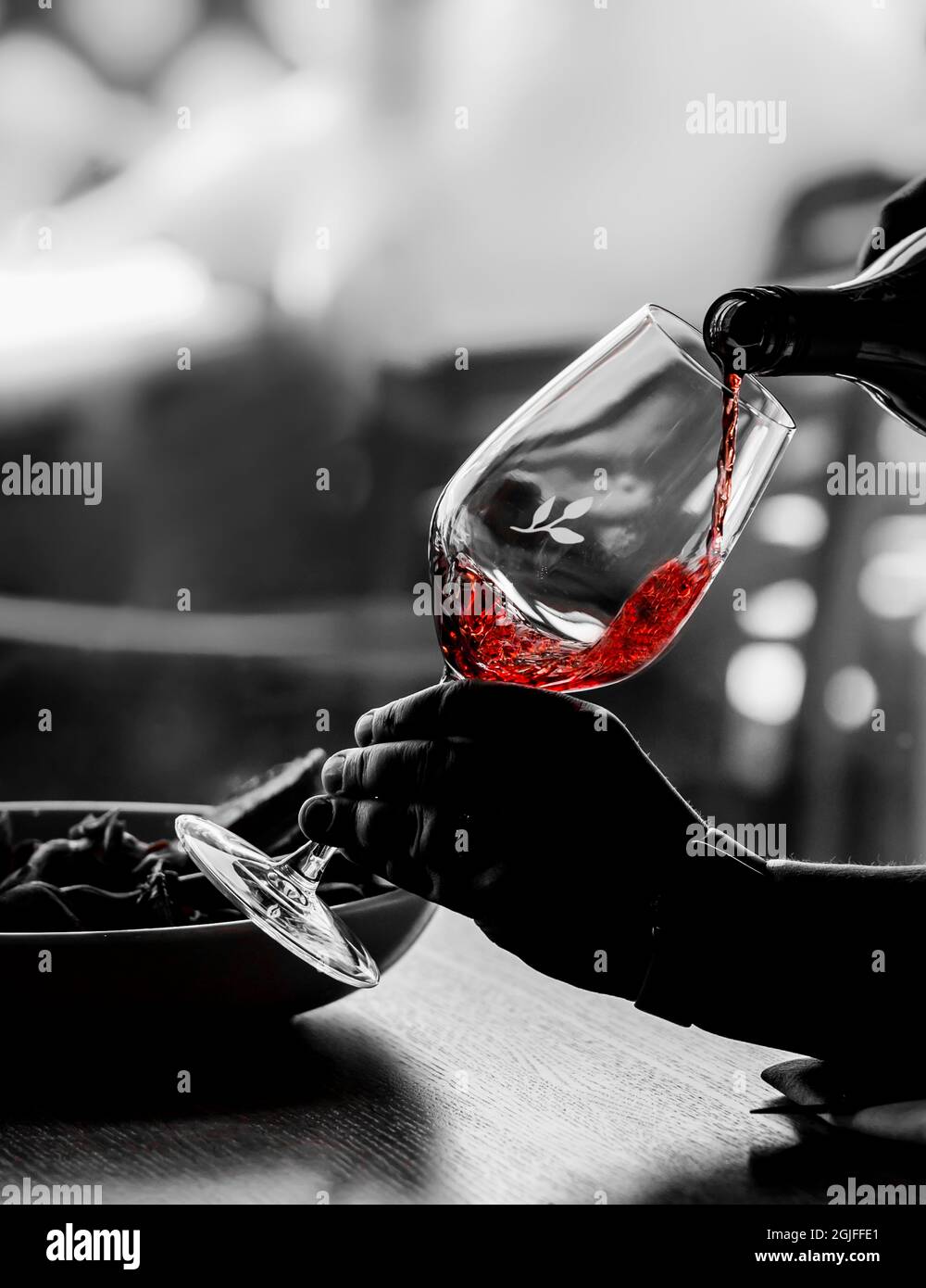 USA, Washington State, Woodinville. Red wine pouring at Heritage