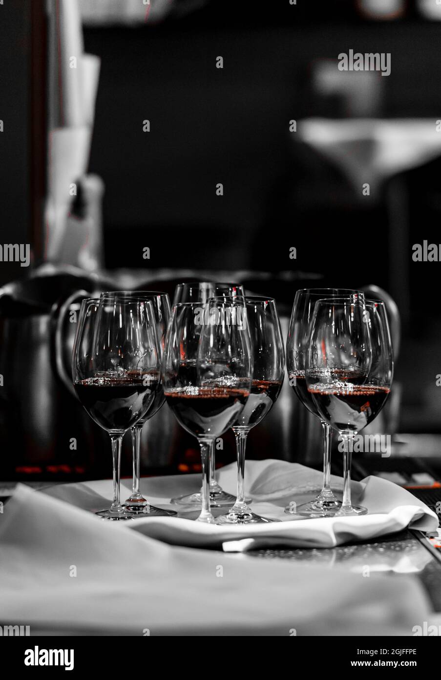 USA, Washington State, University Place. Red wine pouring at a winemaker dinner. Stock Photo