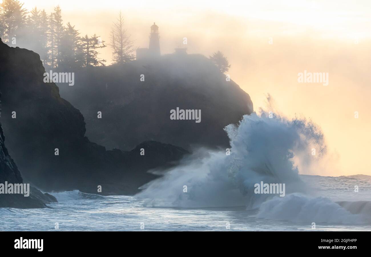 Washington State, Lighthouse and king tide surf, Cape Disappointment ...