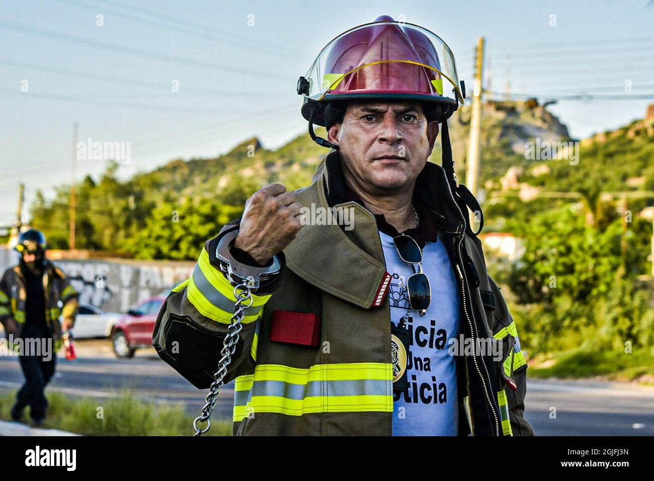 Hermosillo firefighters and their families marched on Wednesday afternoon in protest against the accusations of their colleagues prosecuted for the case of the ABC Nursery fire. Members of the Fire Department have been found guilty of the death of the children of the ABC Nursery in 2009. The march culminated in the ruins of the building on September 9 in Hermosillo, Sonora Mexico .. (Photo: Carlos Baro / Norte Photo )   Bomberos de Hermosillo y sus familaires marcharon por la tarde de miércoles en protesta contra las acusaciones de sus compañeros procesados por el caso del incendio de la Guard Stock Photo