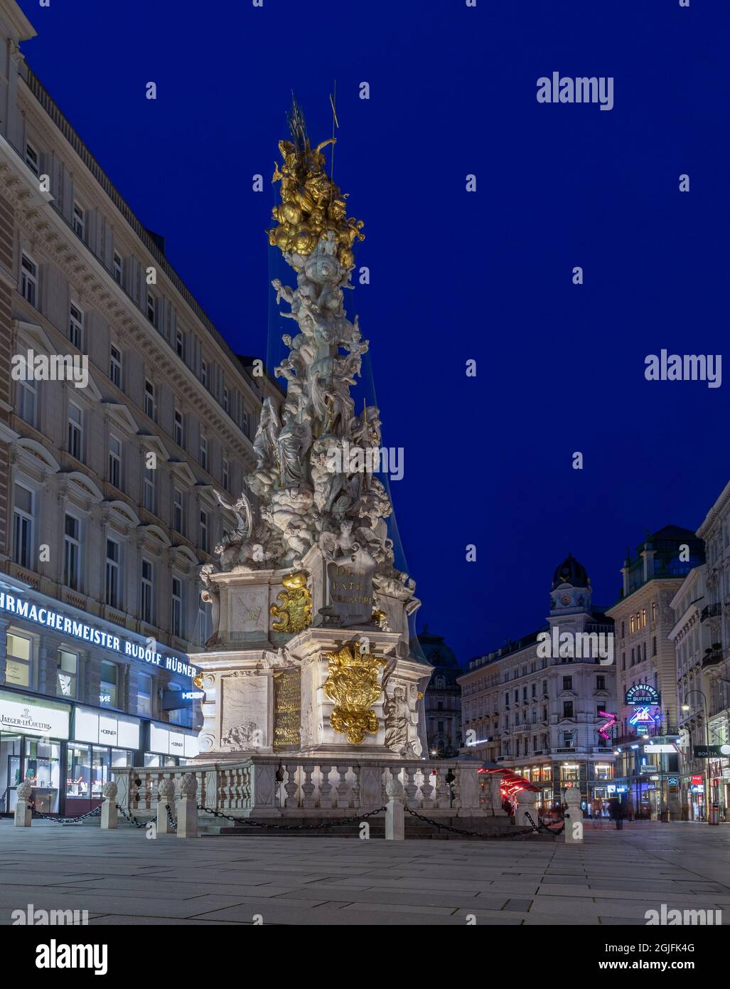 A picture of the Plague Column, in Vienna, at night. Stock Photo