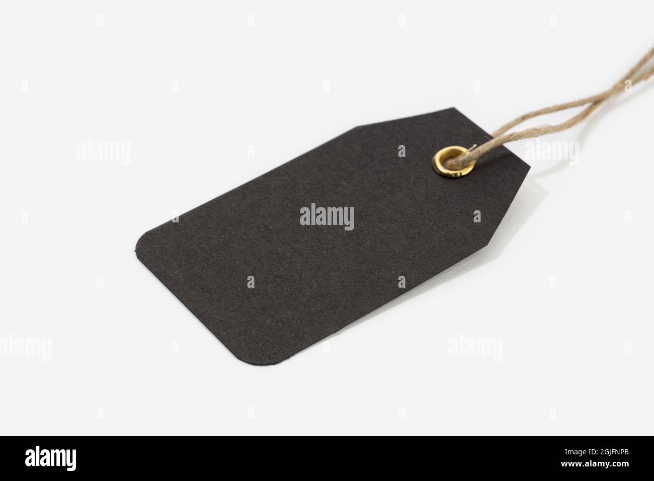 Black Tag with String isolated on white background. Blank cardboard price template Stock Photo