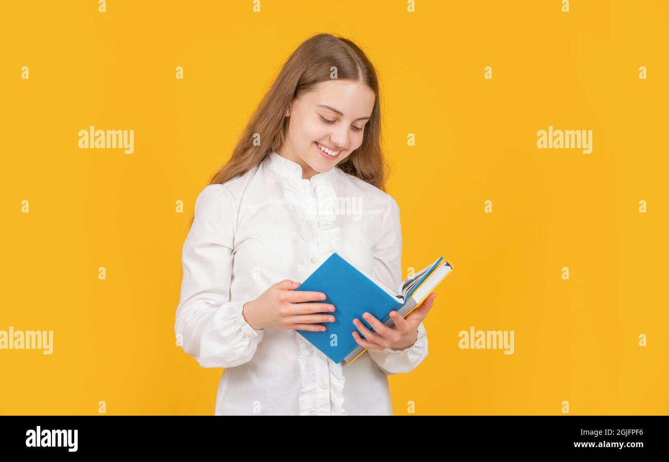 happy teen girl in white shirt ready to study do homework read book on ...