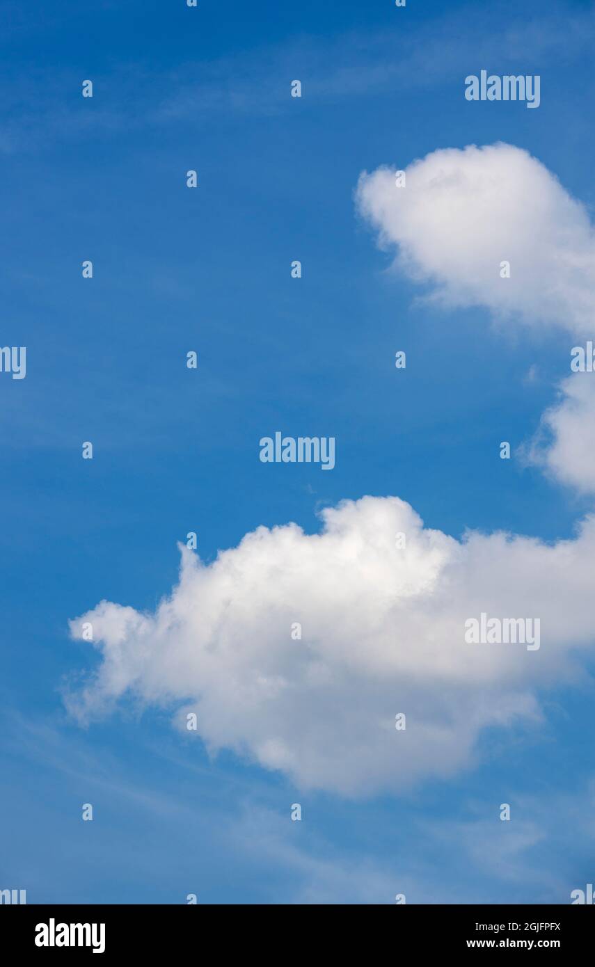 A blue sky with white clouds Stock Photo