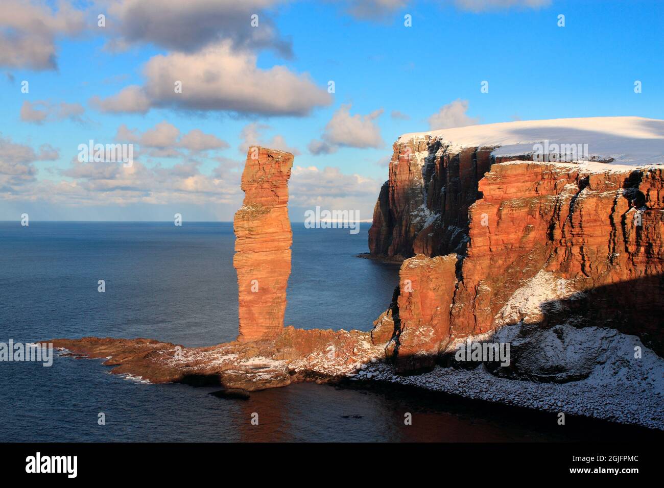 Old Man of Hoy and St John's Head cliffs in winter, Orkney Isles Stock Photo