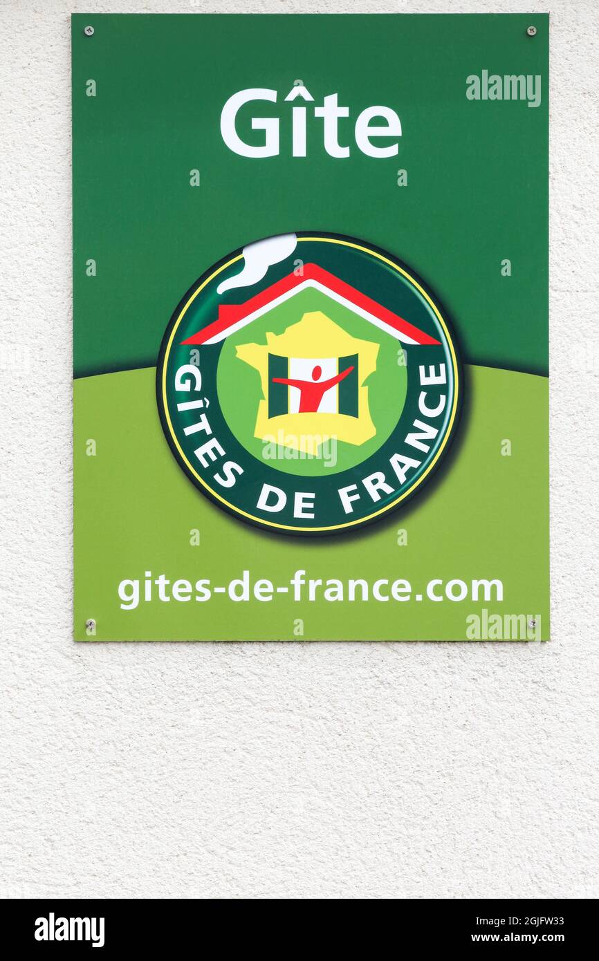 Guereins, France - July 31, 2021: Gites de France sign on a wall. Gites de France is a holiday home in France available for rent Stock Photo
