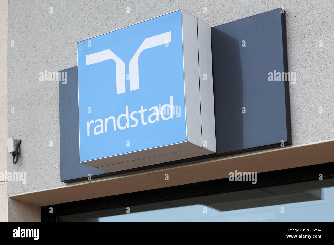 Villefranche, France - July 10, 2021: Randstad logo on a wall. Randstad is a Dutch multinational human resource consulting firm Stock Photo