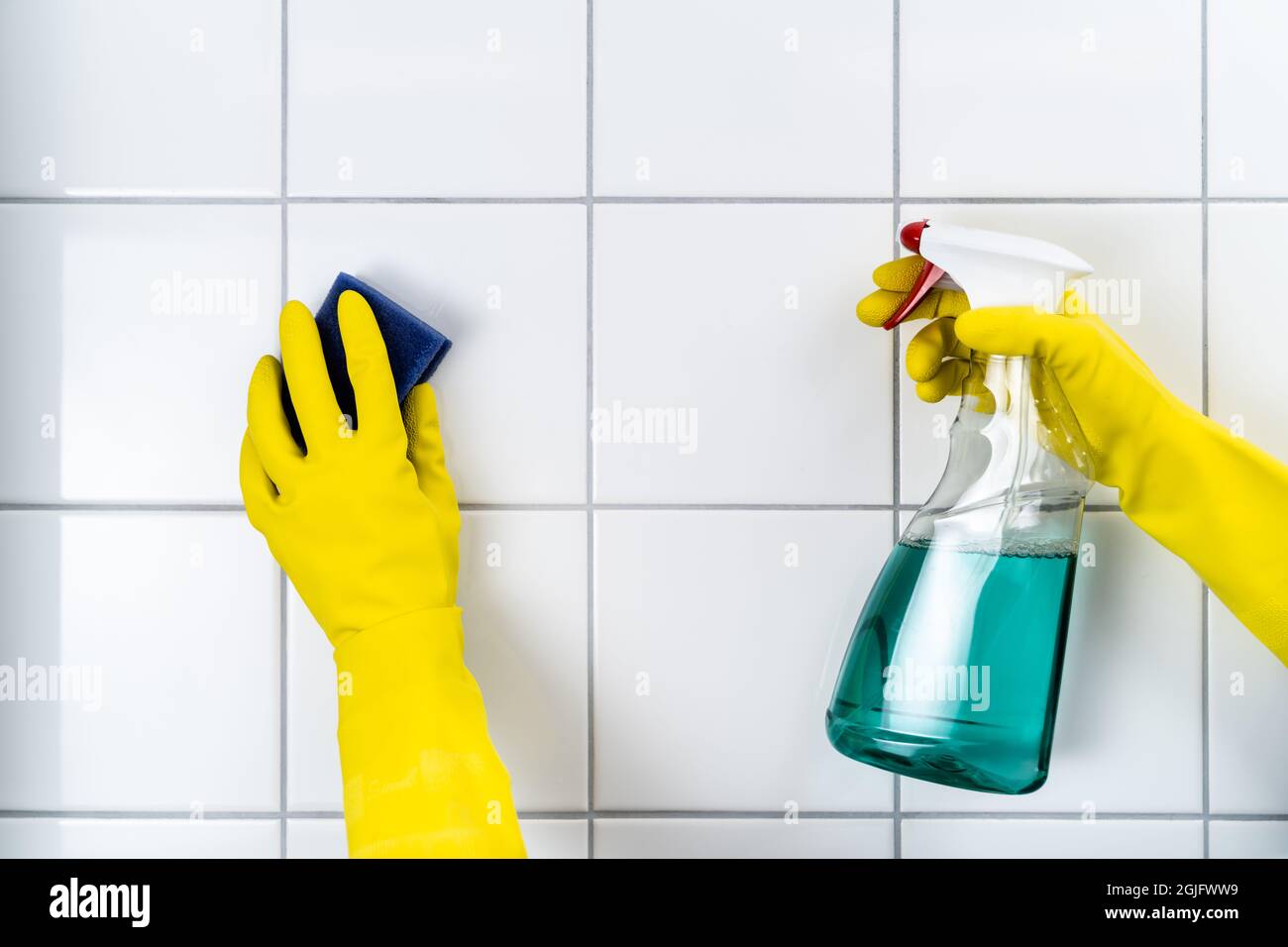 Tile Wall Grout Cleaning With Sponge And Goggles Stock Photo