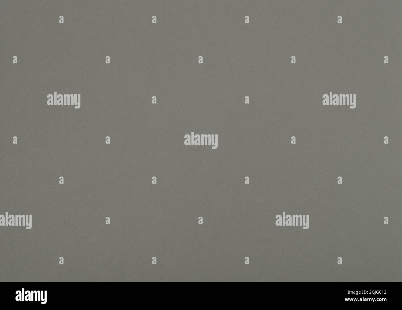 Medium grey paper background. Greenish grey colour paper texture. Stock Photo