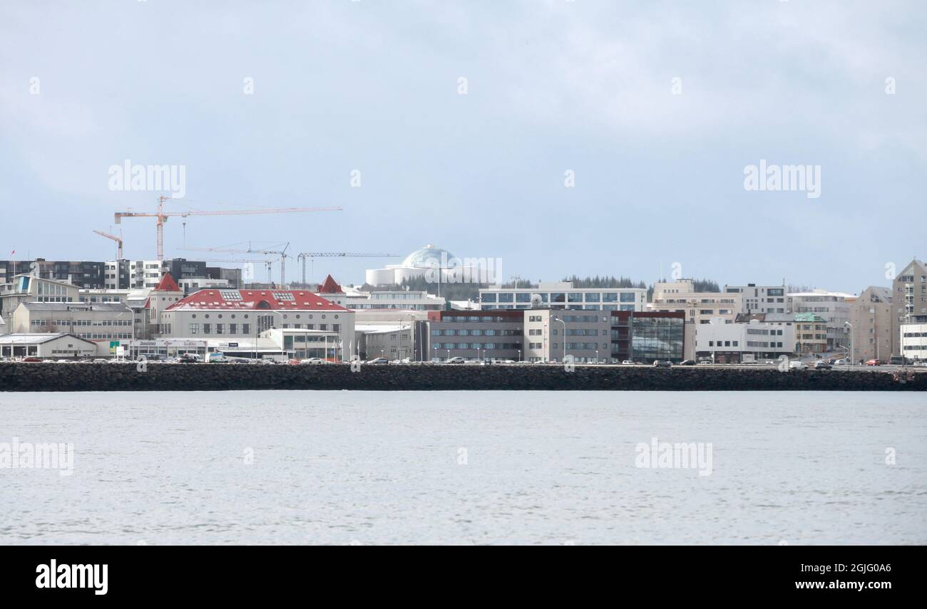 Reykjavik, Iceland - April 4, 2017: Coastal cityscape with the Perlan, a prominent landmark in the Icelandic capital of Reykjavik Stock Photo