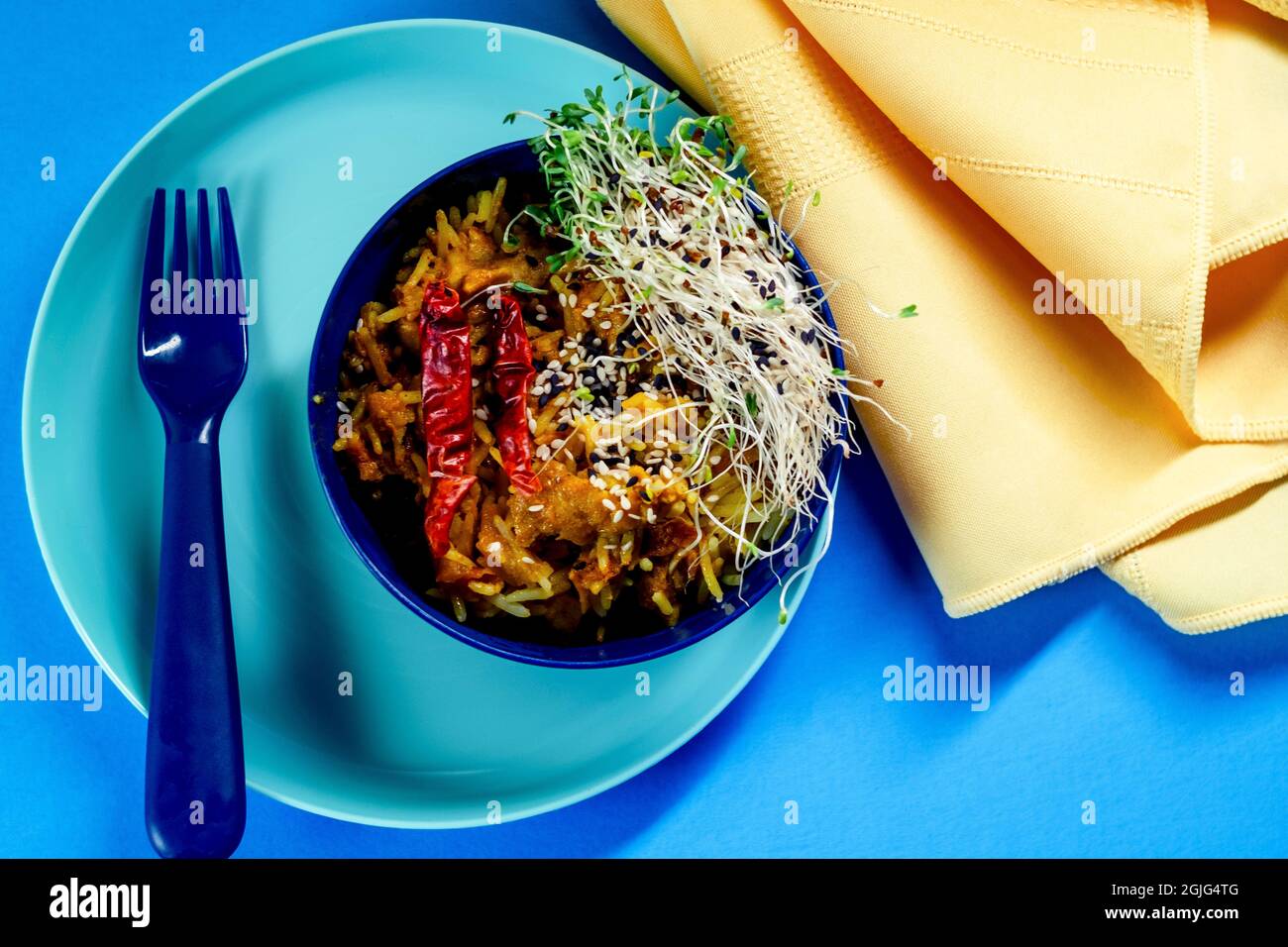 Fun kids lunch spicy Indian chicken biryani rice with dried red peppers ...