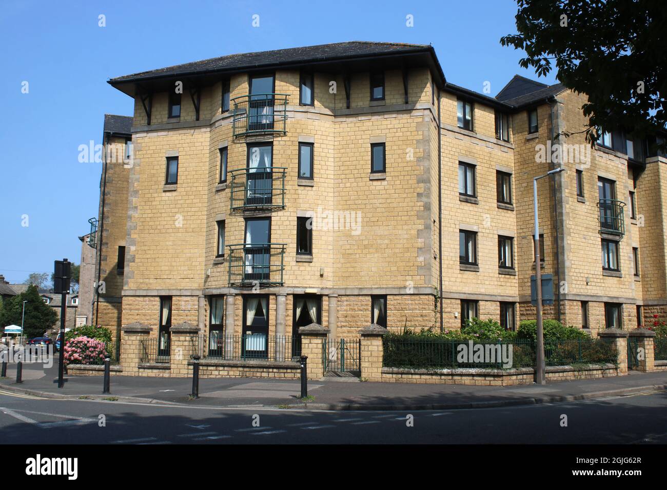 View of the exterior of Spinners Court, apartment block for the over 55s, at the junction of