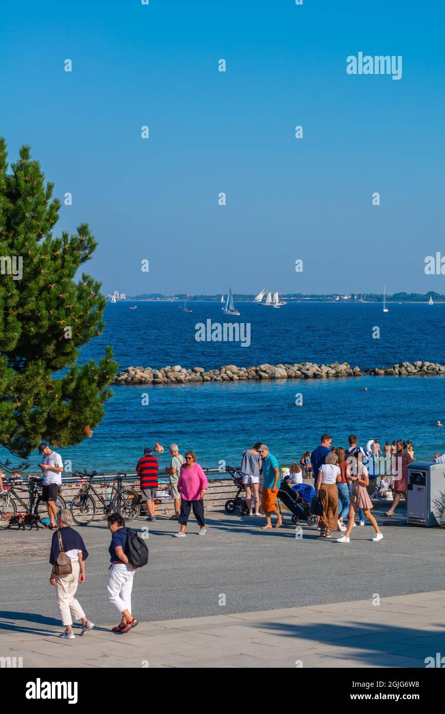 Sandy beach in Kiel-Schilksee on the Baltic Sea, people sunbathing and swimming, Kiel-Schilksee, Kiel, Schleswig-Holstein, Baltic Sea,  North Germany Stock Photo