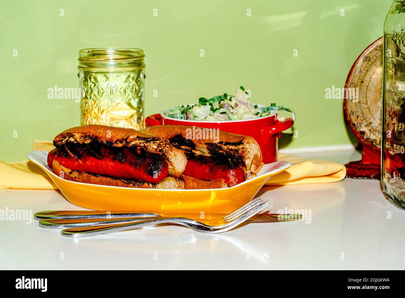 Chargrilled kielbasa sausage sub sandwich with green goddess dressing